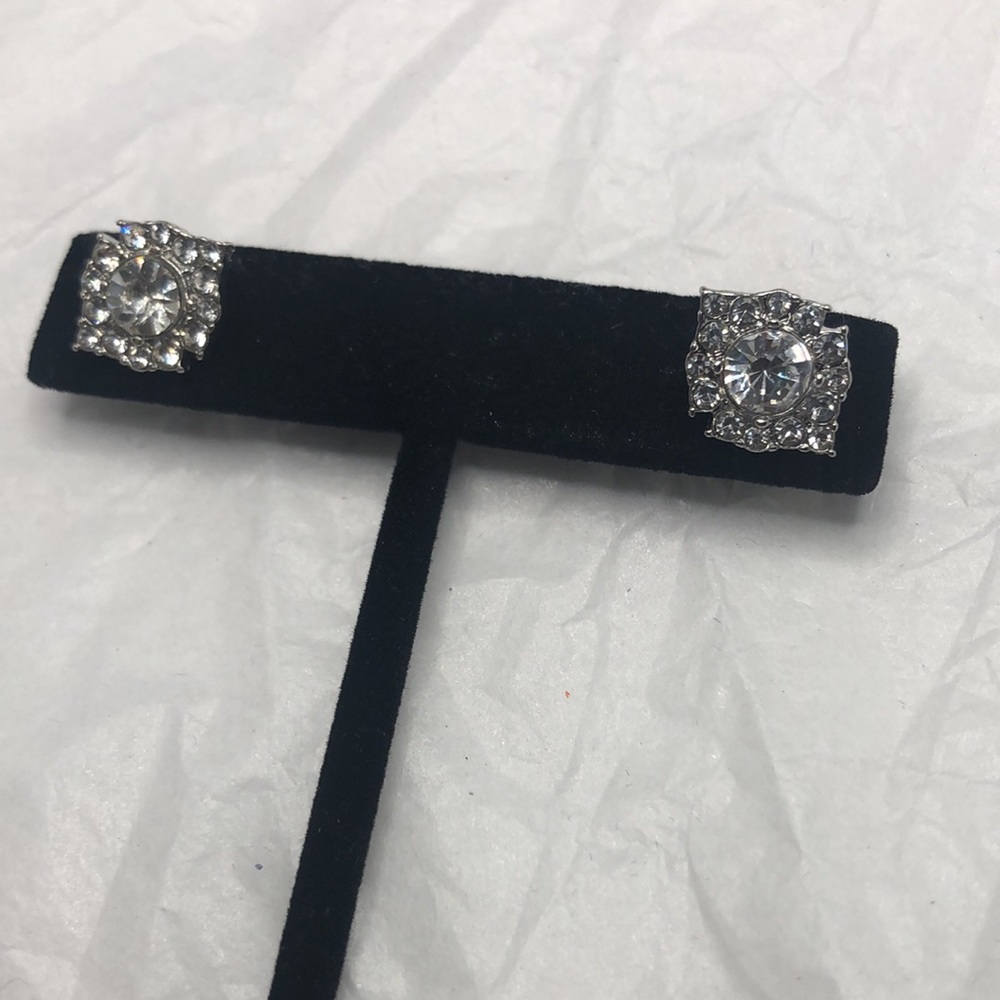 Square stud earrings brand new never worn with shiny bling look.